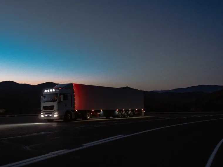 Cargo truck travelling at night